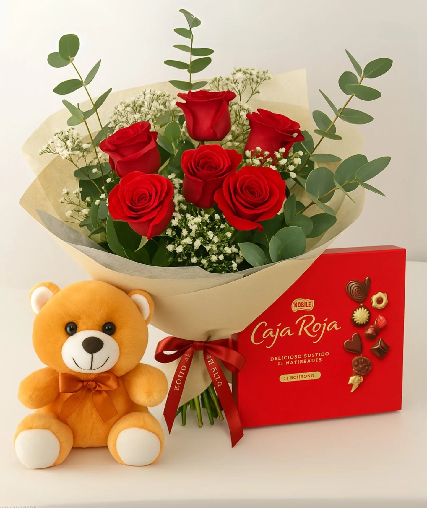 Ramo romántico con 6 rosas rojas, bombones y peluche en Flores La Paz